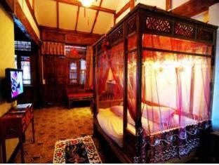 Lijiang Shishan Zhuyuan Hotel Lijiang (Yunnan) Bagian luar foto